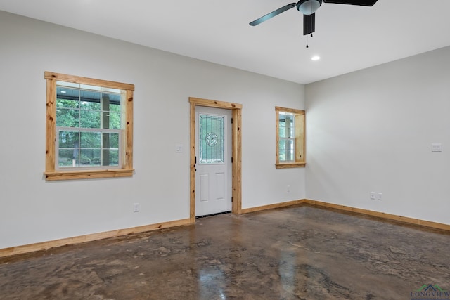 9089 Raspberry Ave, Frankston, TX 75763 - unfurnished room with concrete floors, baseboards, ceiling fan, and recessed lighting