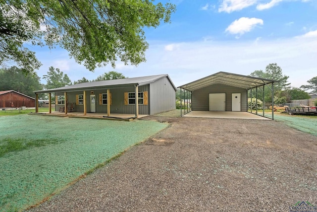9089 Raspberry Ave, Frankston, TX 75763 - view of front of property featuring a garage and covered porch