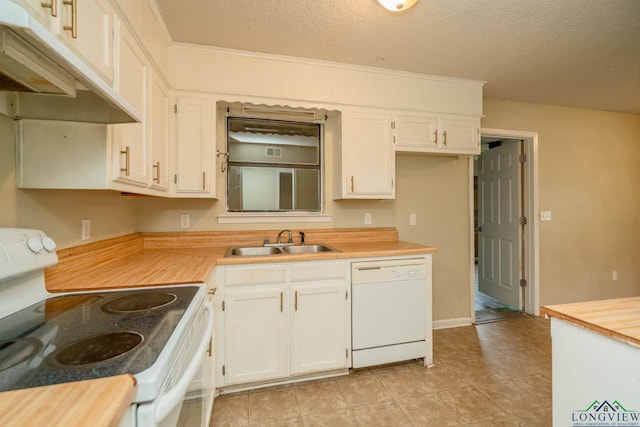 308 N Lee Dr, Gladewater, TX 75647 - kitchen with white appliances, under cabinet range hood, white cabinets, and a textured ceiling