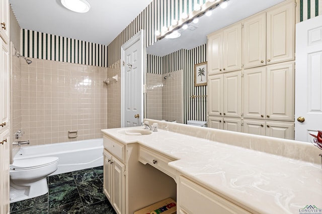 6307 Shady Oaks Dr, Tyler, TX 75703 - full bathroom featuring vanity, toilet, bathing tub / shower combination, and marble look tile flooring