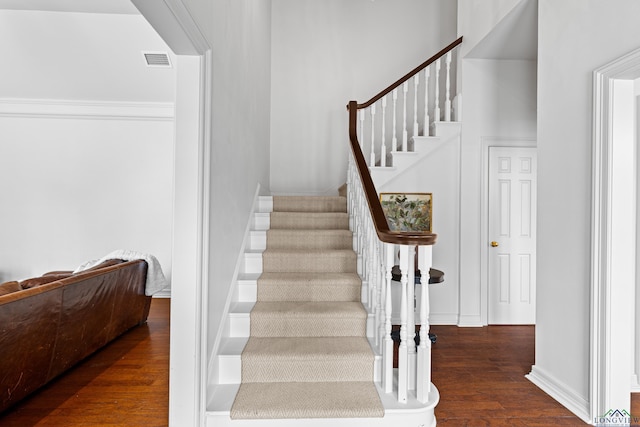 6307 Shady Oaks Dr, Tyler, TX 75703 - stairway with wood finished floors and baseboards
