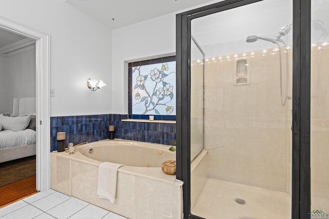 6307 Shady Oaks Dr, Tyler, TX 75703 - full bathroom featuring a jetted tub, tile patterned flooring, a stall shower, and ensuite bath