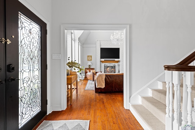 6307 Shady Oaks Dr, Tyler, TX 75703 - entryway featuring wood finished floors, stairway, plenty of natural light, and baseboards