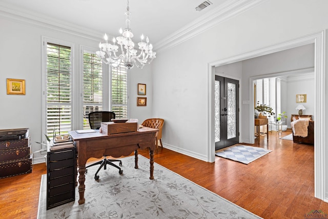 6307 Shady Oaks Dr, Tyler, TX 75703 - office area with wood finished floors, crown molding, a chandelier, and baseboards
