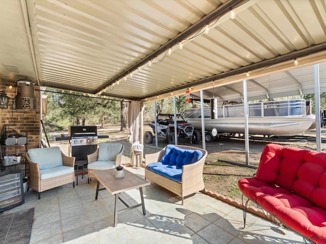 view of patio / terrace featuring visible vents, a carport, a grill, and outdoor lounge area