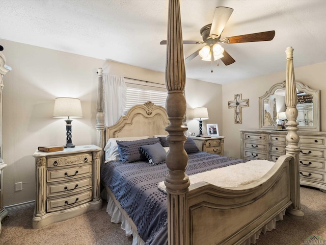 carpeted bedroom with a ceiling fan