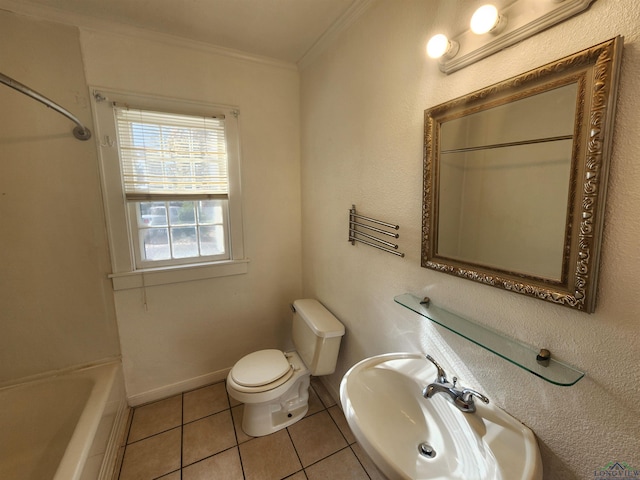 bathroom featuring tile patterned floors, crown molding, sink, and toilet