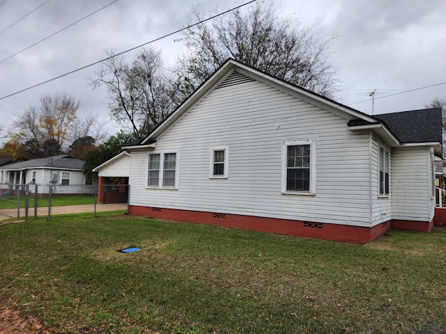 view of property exterior featuring a yard