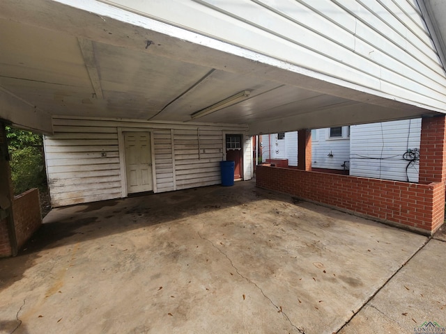 garage with a carport