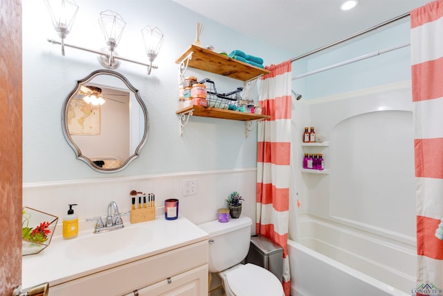 full bathroom with vanity, toilet, and shower / tub combo with curtain