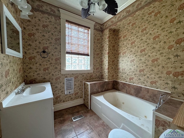 bathroom featuring tile patterned floors, heating unit, vanity, ornamental molding, and a bathtub