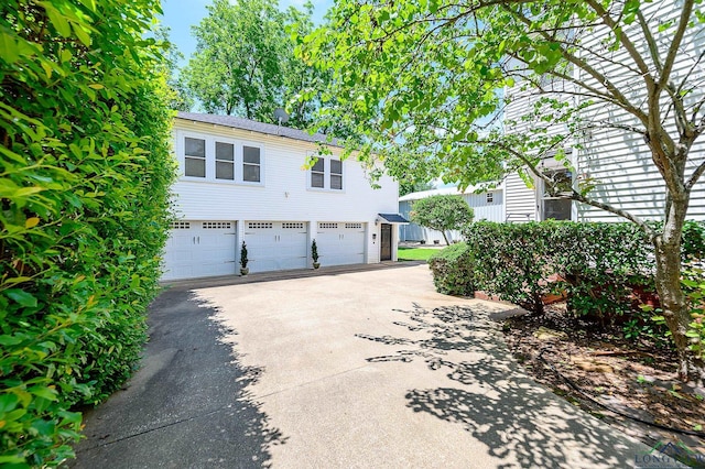 exterior space featuring a garage