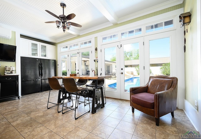 sunroom / solarium with a wall mounted AC, ceiling fan, french doors, and beamed ceiling