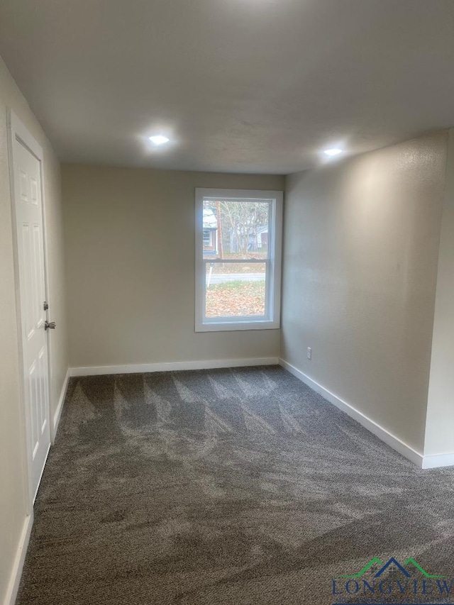 view of carpeted spare room