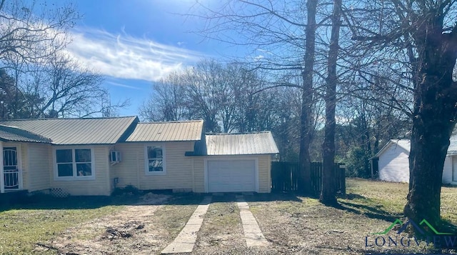 view of side of property featuring a garage