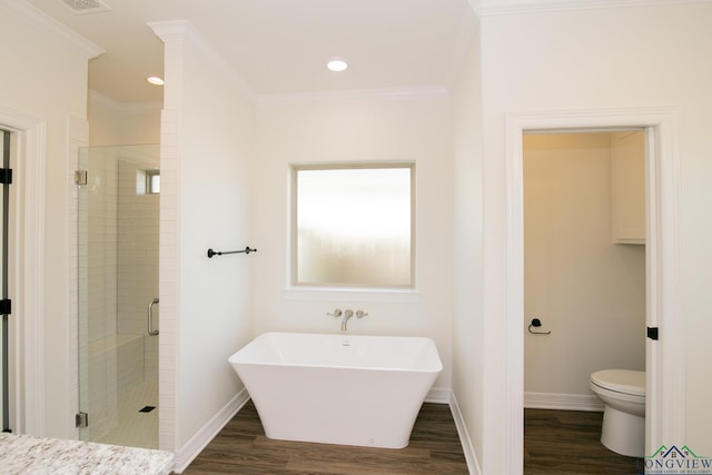 bathroom with ornamental molding, toilet, wood-type flooring, and shower with separate bathtub