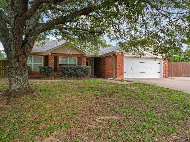 ranch-style home with an attached garage, driveway, and brick siding