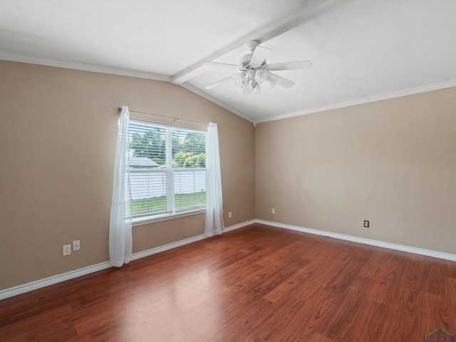 spare room with a ceiling fan, wood finished floors, baseboards, and crown molding