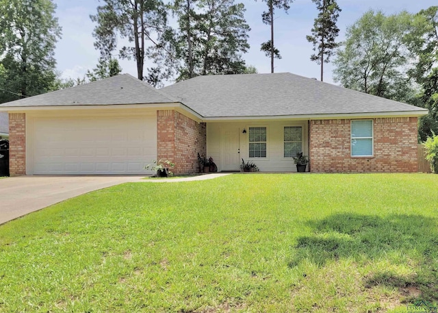 ranch-style home featuring a garage and a front yard