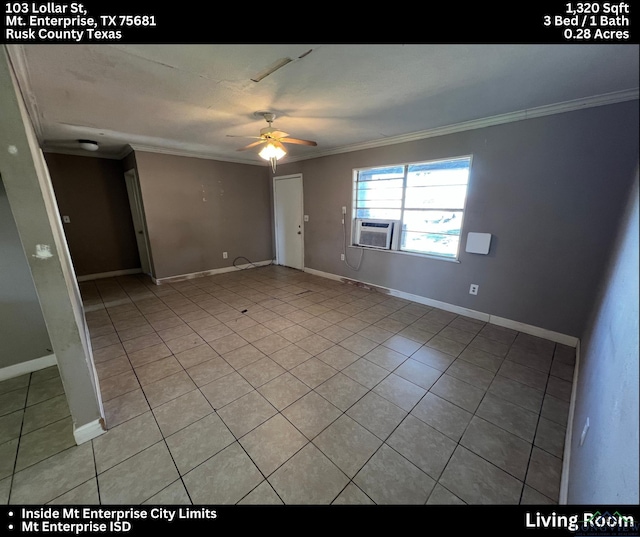 tiled empty room with ceiling fan, cooling unit, and crown molding