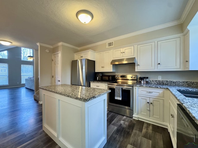 kitchen featuring white cabinets, dark hardwood / wood-style floors, stone counters, and stainless steel appliances