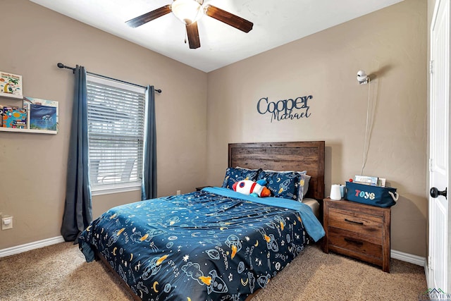 bedroom with carpet, baseboards, and ceiling fan