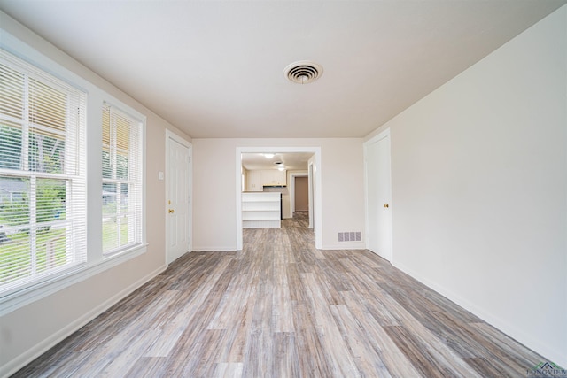 206 Empire St, Gladewater, TX 75647 - unfurnished room with wood finished floors and baseboards
