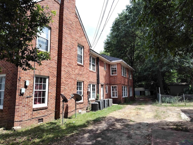 view of home's exterior with cooling unit