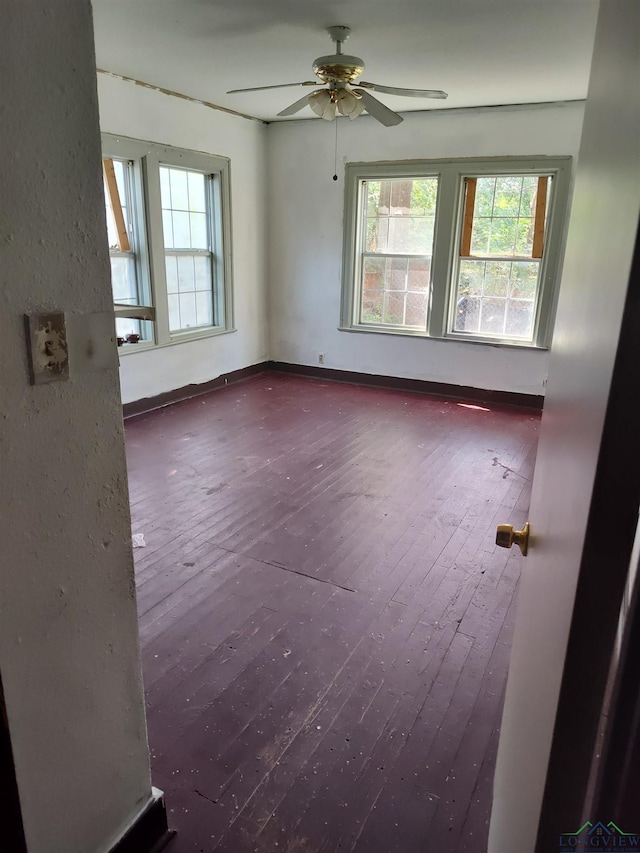 spare room with ceiling fan