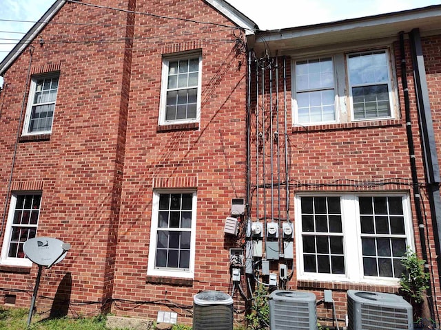 view of side of property featuring cooling unit