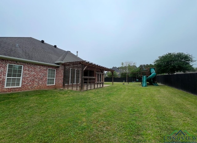 view of yard featuring a playground