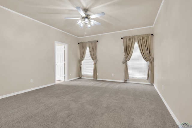 empty room with ceiling fan, crown molding, plenty of natural light, and light carpet