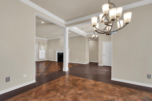 unfurnished dining area with a chandelier, crown molding, decorative columns, and dark wood-type flooring