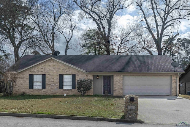 ranch-style house featuring a front lawn, brick siding, driveway, and an attached garage