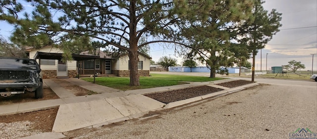 view of front of house with a lawn