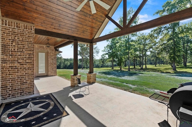 view of patio / terrace with ceiling fan and a grill