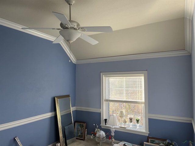 office featuring carpet flooring, ceiling fan, and ornamental molding