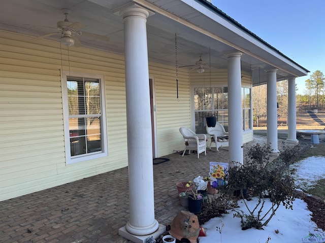 view of patio featuring ceiling fan and covered porch