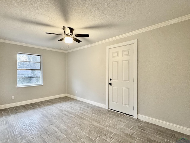 empty room featuring crown molding, ceiling fan, a textured ceiling, and light wood-type flooring