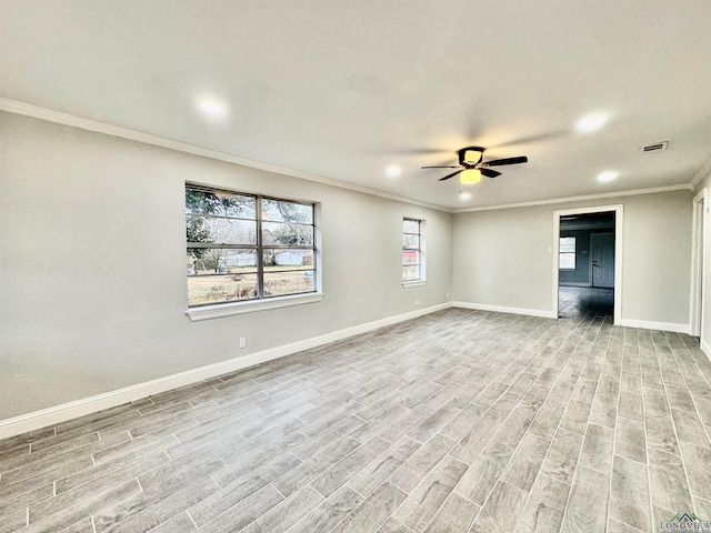 unfurnished room featuring ceiling fan, ornamental molding, and light hardwood / wood-style floors