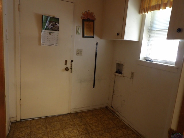 laundry area with cabinets and hookup for a washing machine