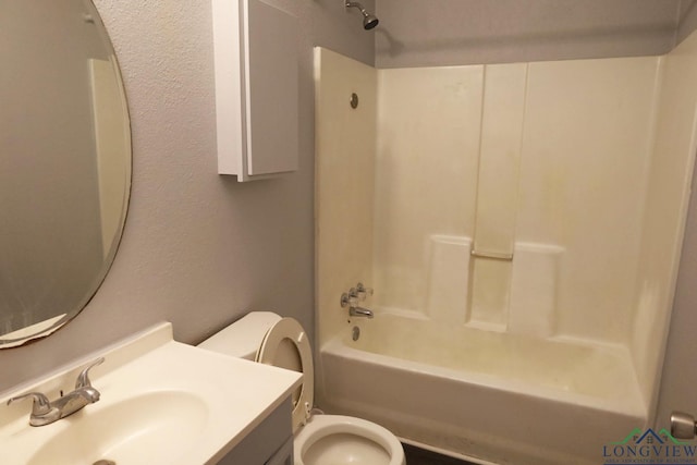 2104 Ark St, Marshall, TX 75670 - full bath with bathing tub / shower combination, vanity, and a textured wall