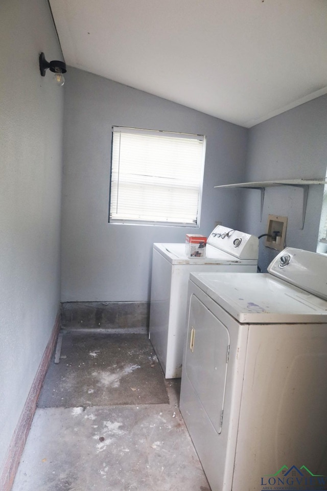 2104 Ark St, Marshall, TX 75670 - washroom with washer and dryer and baseboards