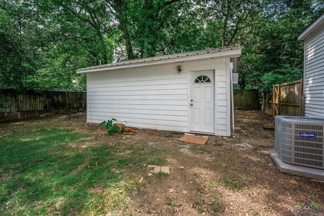 1021 N Montgomery St, Gilmer, TX 75644 - view of shed with a fenced backyard