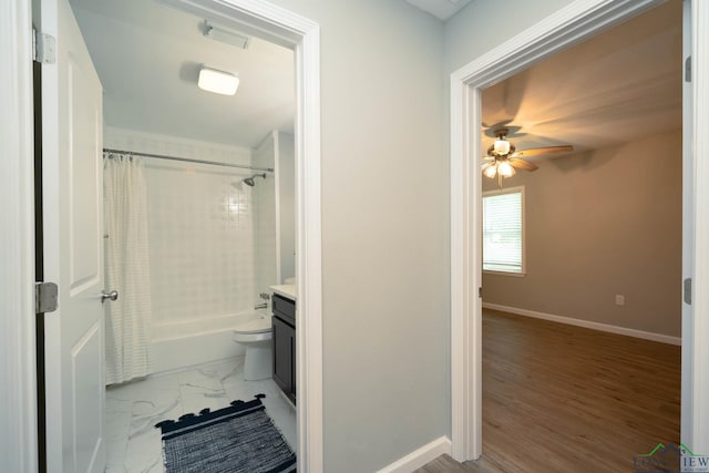 1021 N Montgomery St, Gilmer, TX 75644 - full bath with vanity, shower / bath combo, and a ceiling fan