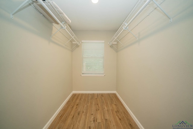1021 N Montgomery St, Gilmer, TX 75644 - spacious closet with light wood finished floors