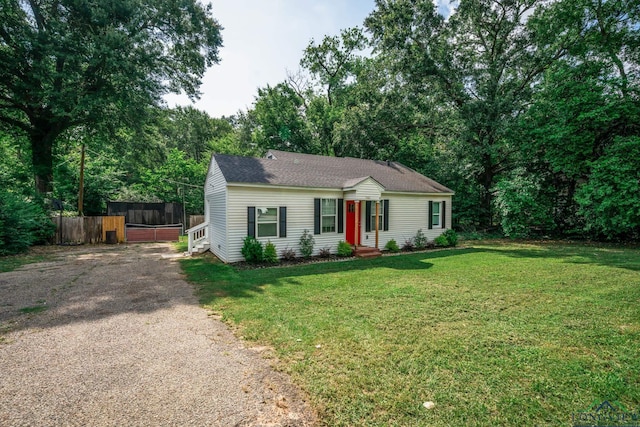 1021 N Montgomery St, Gilmer, TX 75644 - view of front of property with gravel driveway