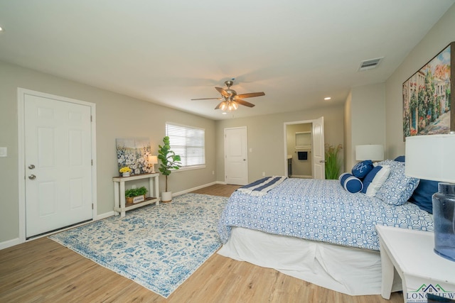 1021 N Montgomery St, Gilmer, TX 75644 - bedroom with wood finished floors, a ceiling fan, and recessed lighting