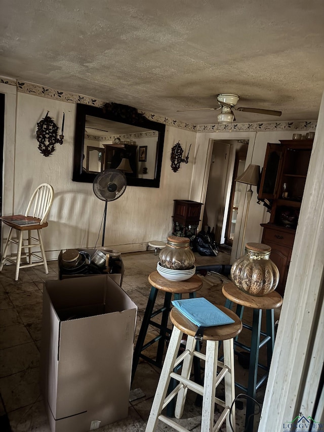 living room with a textured ceiling