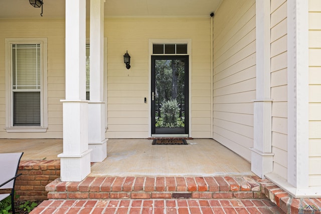 5201 Whitaker, Longview, TX 75605 - property entrance with a porch